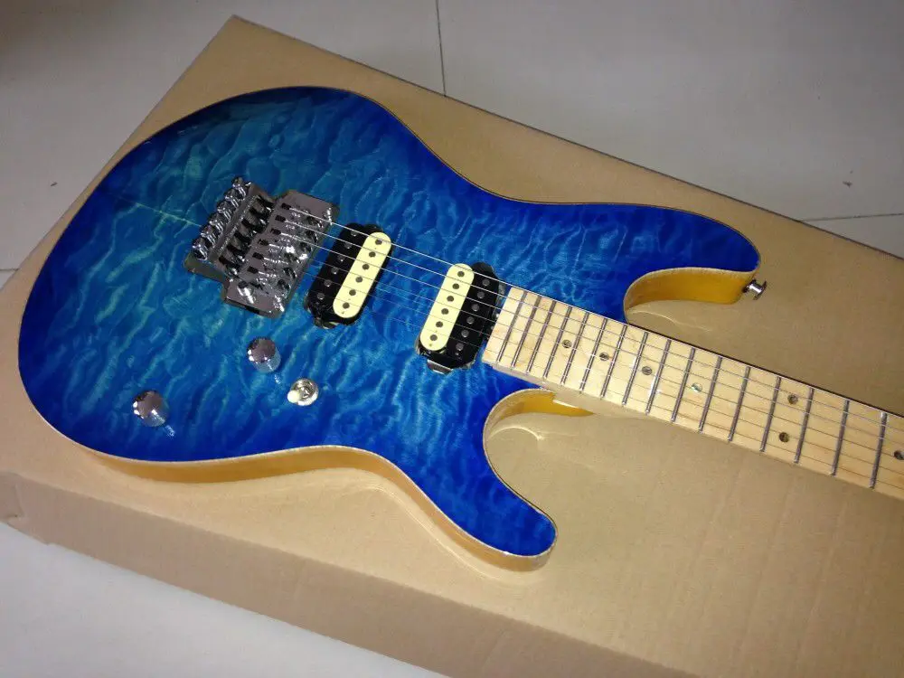 

china factory ,blue color flame top electric guitar. maple fingerboard.high quality pickup.6 stings electric guitar.real photos