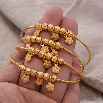 

Annayoyo African 4pcs/lot Gold Color Bangle for Girls/Baby/Kids Charm Gypsophila Bracelet Bells Heart Jewelry Child Christmas Gi