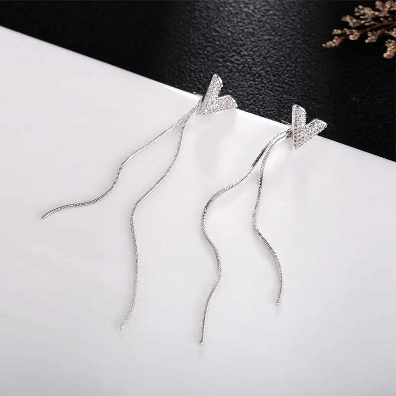 

LK Korean fashion long fringed V-shaped flash diamond zircon earrings anti-allergic two ways to wear, Christmas gift
