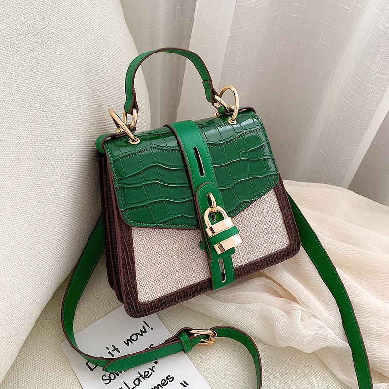 

New Crocodile-like Stereo trapezoidal ladder lady bag with metal lock and one shoulder inclined shoulder handbag