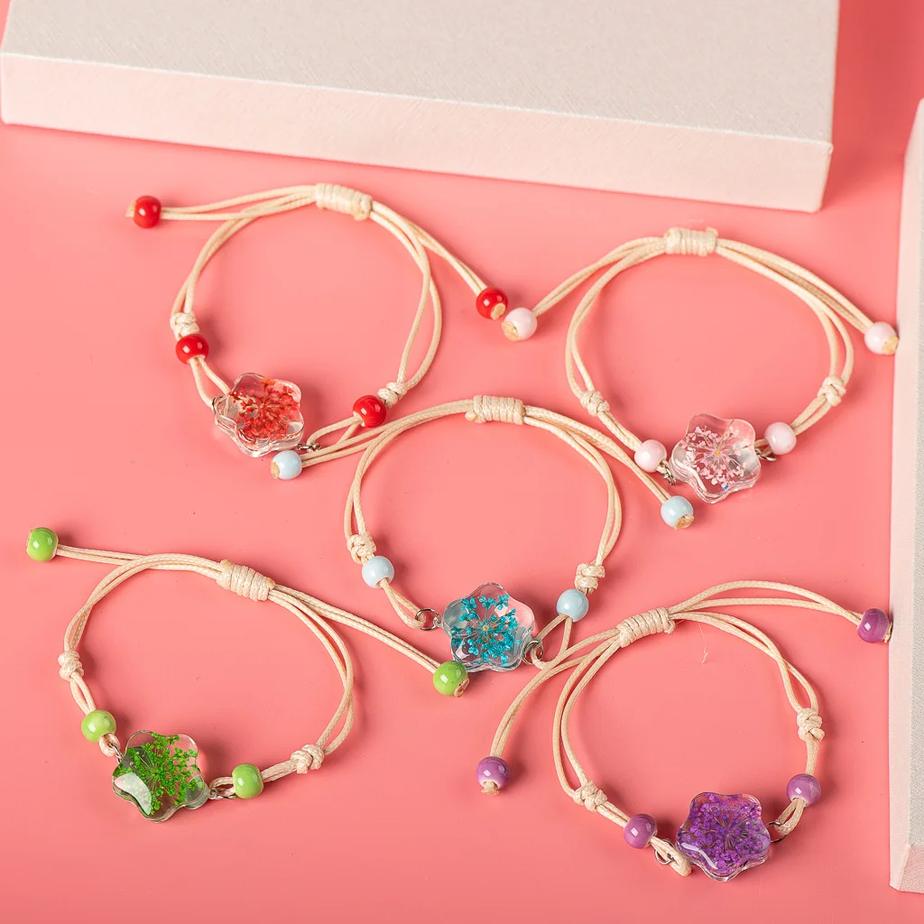 Браслет женский стеклянный с керамическими бусинами со звездами и цветами |