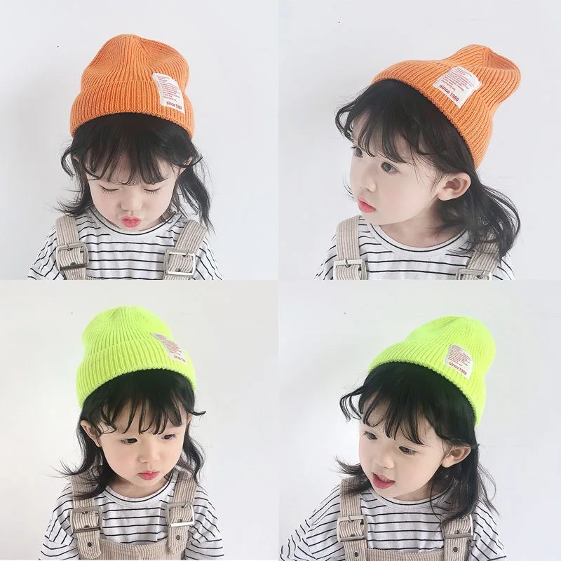 

Autumn and winter children's wool hats fashion Korean candy color boys and girls knit pullover hats children warm hats cold hats