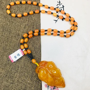 

Zheru natural beeswax brown yellow leaf pendant with yellow bead necklace beautiful men and women sweater chain