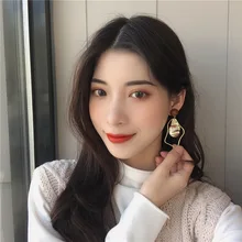 

Korean temperament retro earrings ear clips geometric irregular dripping oil asymmetric simple girl earings sterling silver 925