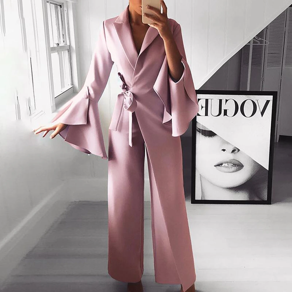 

OMILKA Wide Leg Rompers and Jumpsuits 2019 Autumn Winter Women Flare Sleeve V Neck Irregular Bandage Loose Club Party Overalls