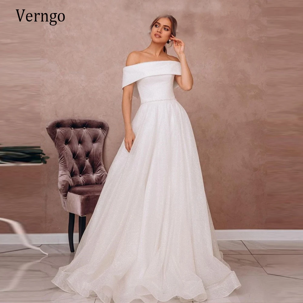 

Verngo Glitter A Line Wedding Dress 2021 Off the Shoulder Boat Neck Short Sleeves Lace Up Back Bridal Dresses With Crystal Sash
