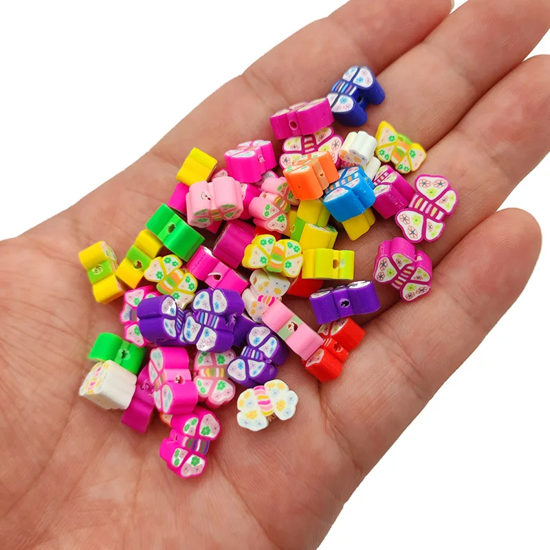 thumbnail image 1 of 50-100 piezas de espaciadores de arcilla polimérica con forma de flores, frutas, estrellas, mariposas y corazones, cuentas sueltas para hacer joyas, pulseras y collares, 1 of 5