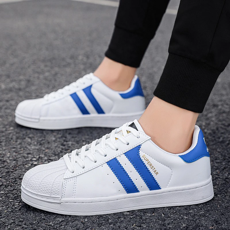 Zapatillas de deporte de cuero de moda para hombre, zapatos masculinos de estilo coreano, estilo británico, versátiles, de malla, color negro