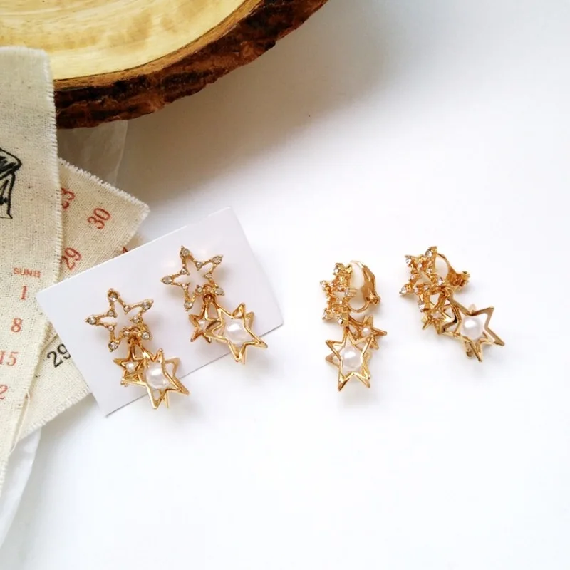 

Korean Creative Beautiful Hollow Star Clip Earrings Personality Temperament Imitation Pearl Jewelry Girl Women's Accessories