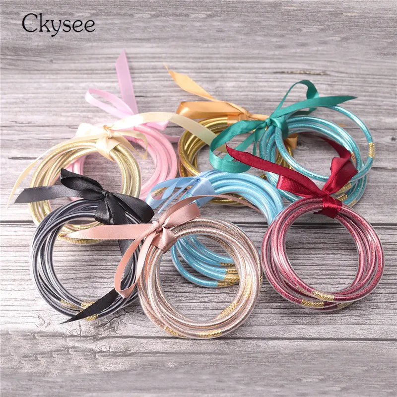 

Colorful Bracelet 5 Pcs Set Gitter Filled Stardust Stack Silicone Circles Bangles Women Bowknot Jelly Bangles PRAYER Jewelry