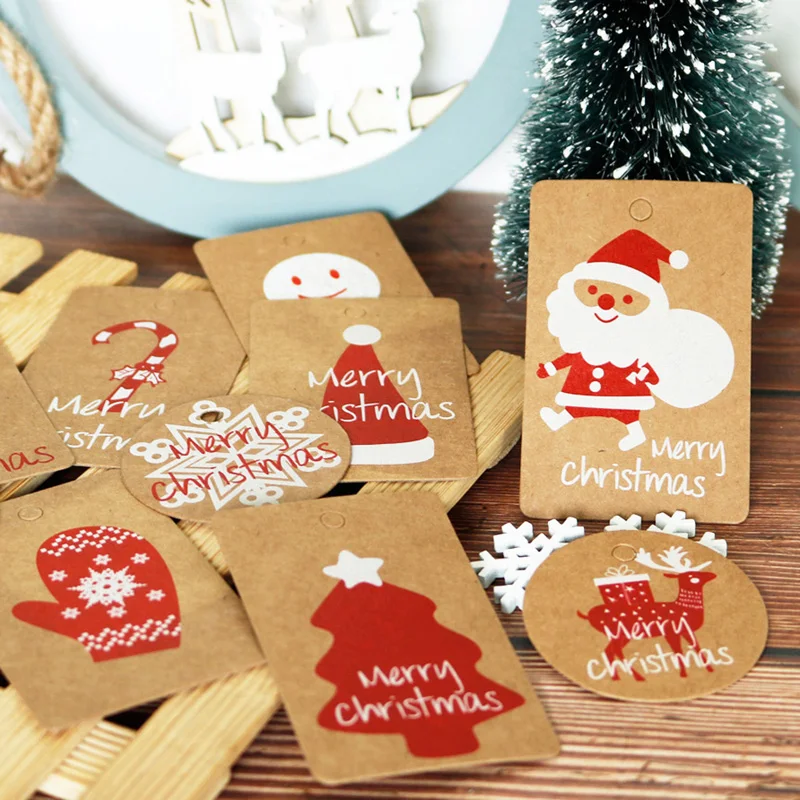 

Merry Christmas Paper Tag 100pcs Mix Design Deer Santa Claus Gift Box Paper Hang Tag Labels Gift Tag with String Xmas Decoration