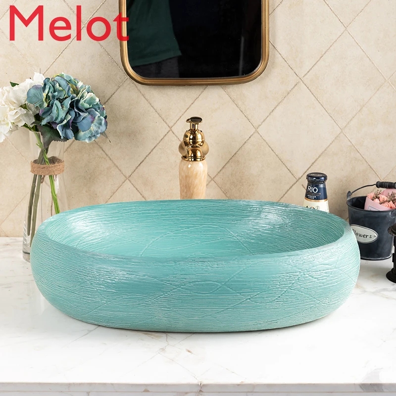 

Nordic Table Basin Ceramic Household Wash Basin Bathroom Art Table Basin Oval Simple Wash Basin