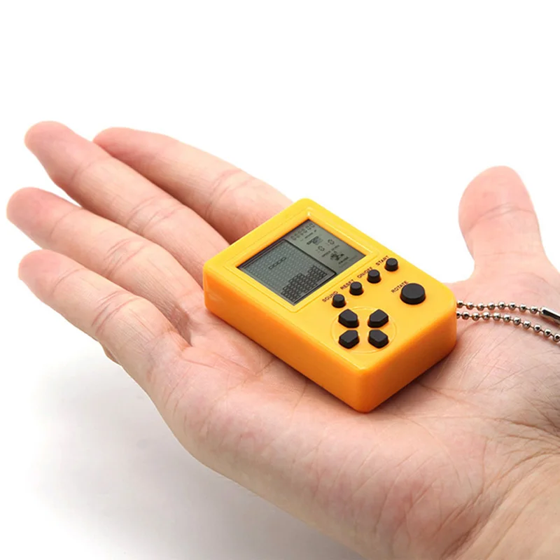 

Tetris Mini Child Keychain Game Console Handheld Game Player capsule toy twisted egg Built-in 26 Games for Kids Gift