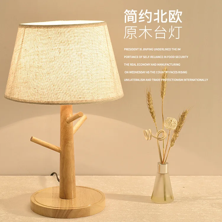 

The r of the Nordic bedroom wooden desk lamp led log warm decoration lamp solid wood bed Japanese