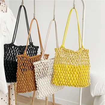 

2020 new ladies knitting bag key bag beach bag hand made grass hollowed-out fishing net bag shoulder strap sling bag purse
