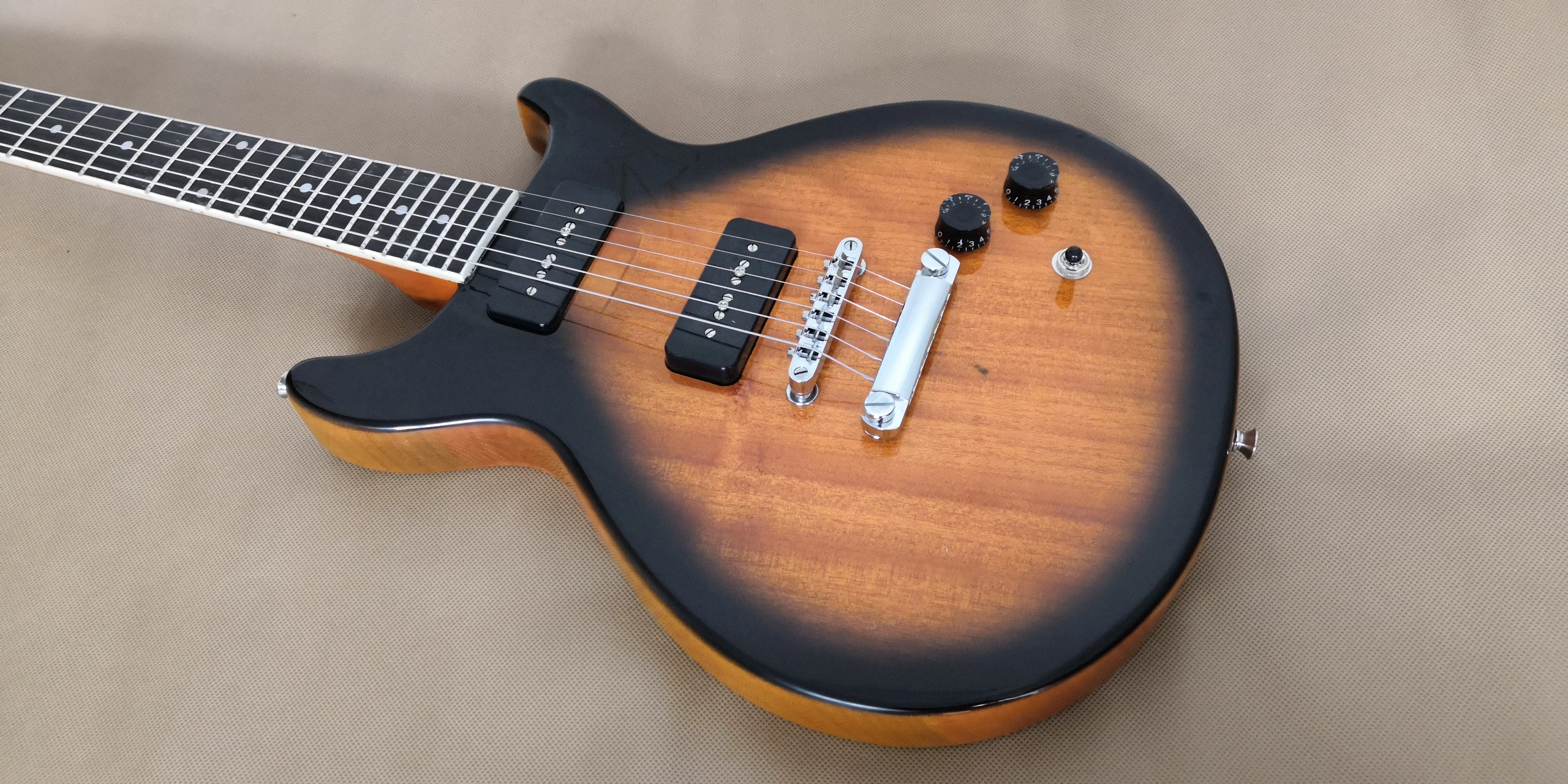 

Sunburst color with double cutway P90 pickup electric Guitar