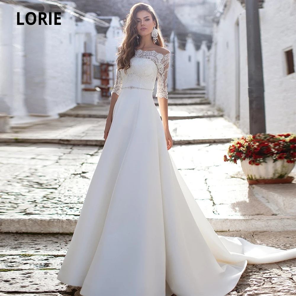Lorie Off De Schouder Satin Bruidsjurken Half Mouwen Kant Terug Illusion Beach Boho Trouwjurken Prinses Party Gown Nieuwe 2020 Lorie Off De Schouder Satin Bruidsjurken Half Mouwen Kant Terug Illusion Beach Boho Trouwjurken Prinses Party Gown Nieuwe 2020
