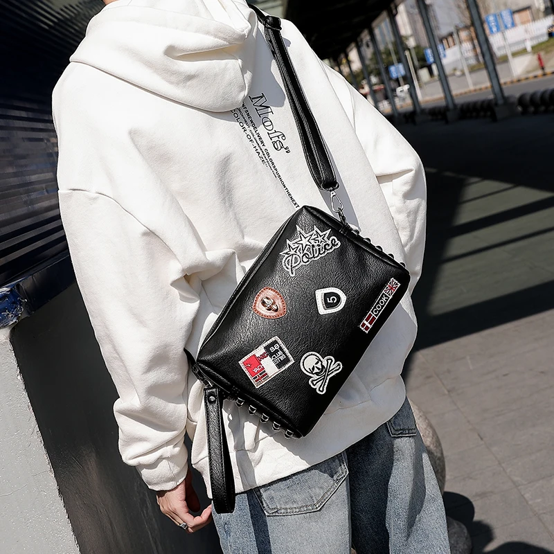 

HOT Male Rivets Handbag Men Skull bag street fashion leisure shoulder bag Cartoon printed Free Shipping
