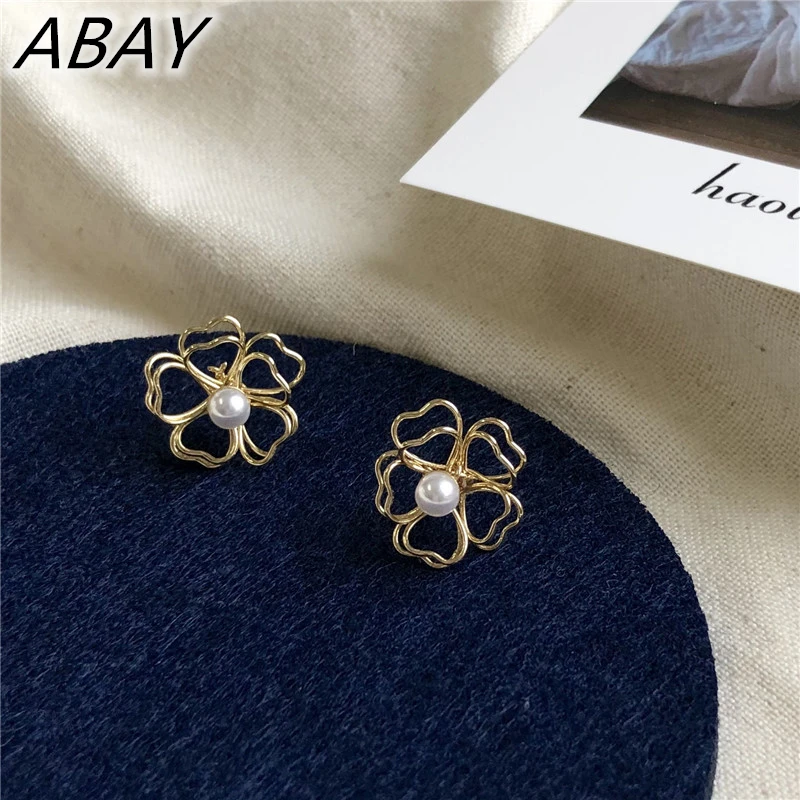 

ABAY Vintage Simple Pearl Flower Stud Earrings Geometric Irregular Petal Pendent Gothic Earrings for Women Girls Ear Jewelry