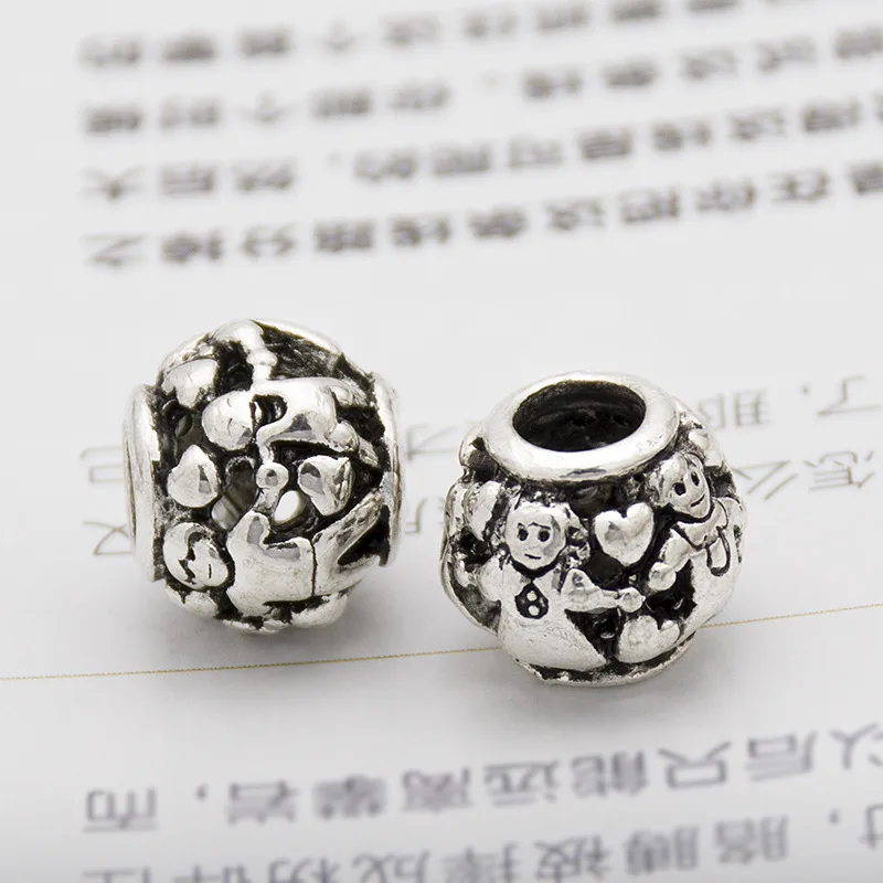 

Alloy Hollow out Boys And Girls Hand in Hand Family Big Hole Beads