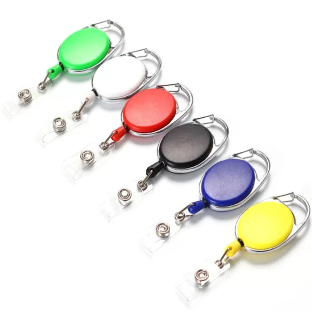 Color retráctil tirar insignia carrete de aleación de Zinc de plástico ABS cordones ID Tarjeta de Identificación insignia carretes de soporte llavero cadena Clips