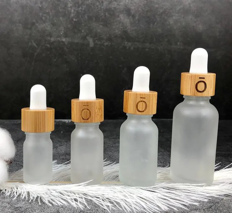 

30Pcs\Lot 5 10 15ml 30ml 50ml Frosted Clear Glass Dropper Bottle With Bamboo Cap 1oz Glass Essential Oil Bottle Custom Logo