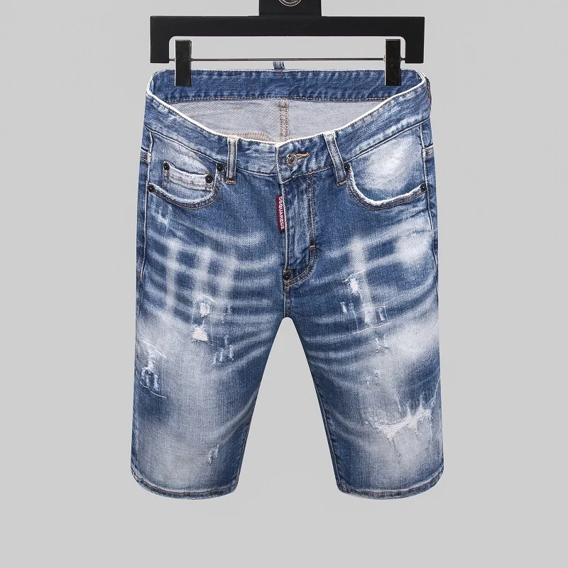 Estilo de verano nuevo y popular marca de vaqueros Italia Slim corto Jeans hombres, pantalones de Denim con cremallera de agujero azul Shorts vaqueros con agujeros