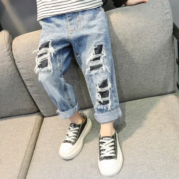 

Spring and autumn new 2-7-year-old children's Korean children's clothing boys and girls baby pants hole casual patch jeans
