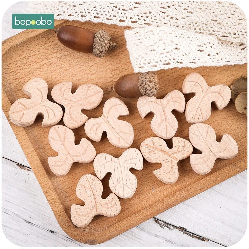 Bopoobo 10pc 너도밤 나무 나무 구슬 Teether 씹을 수있는 별 모양 너도밤 나무 구슬 BPA 무료 나무 젖니가 남 구슬  생산 DIY 공예