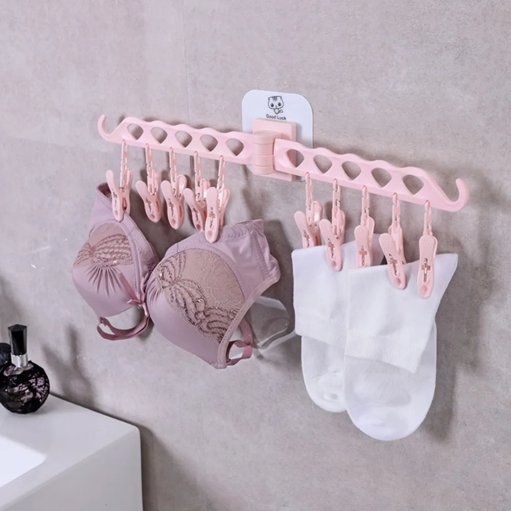 

Suction Wall Type Rotatable Double Rod 10 Clip Drying Rack Suitable For Home Drying Clothing Hanging Underwear