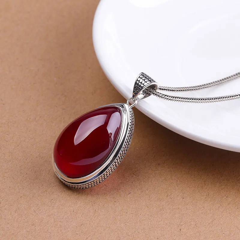 

Character silver items S925 pure silver ornaments Thai silver droplets sweater sautoir Ms. Ruby pendant