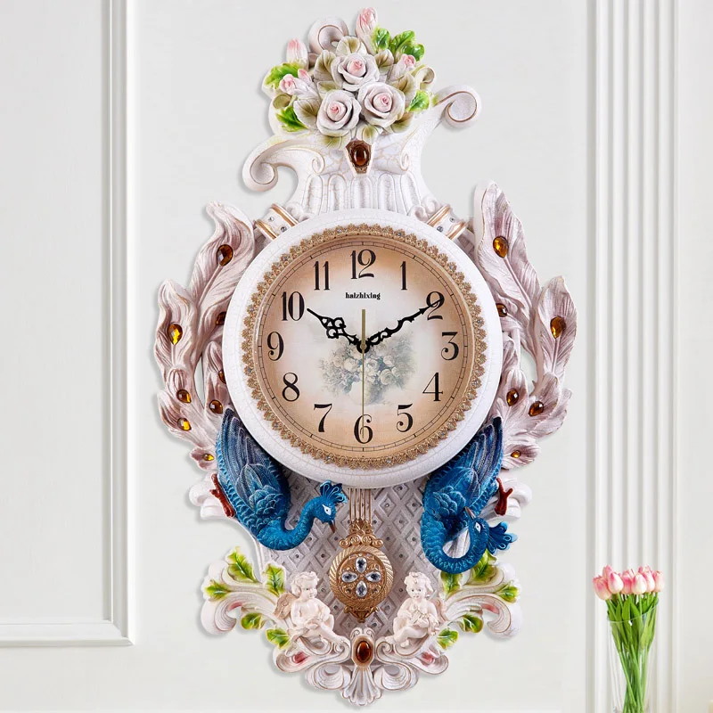 Oversized Peacock Swing Wall Clock