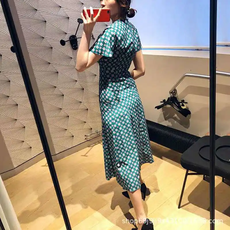 

Method dan shan Zhuo's Home 19 Years Spring And Summer Fashion Short Sleeve V-neck Printed Ladies' Slim Fit Big Hemline Wave Dre