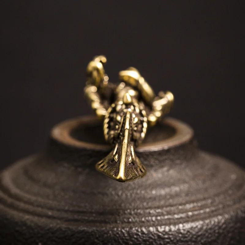 brass vajry charms (8)