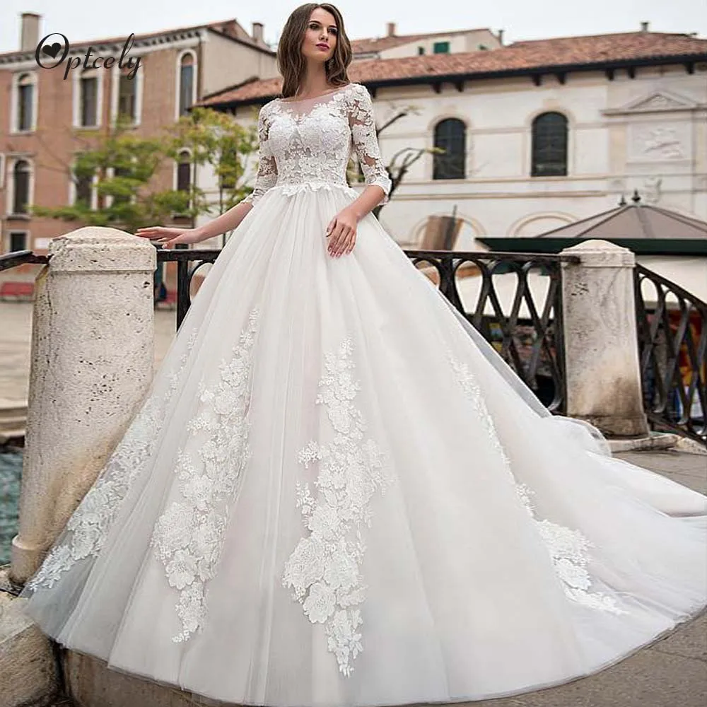 

Optcely Backless Scoop Neck Three Quarter Button A-Line Hall Wedding Dresses 2019 Appliques Beaded Sweep Train Vestido de Noiva