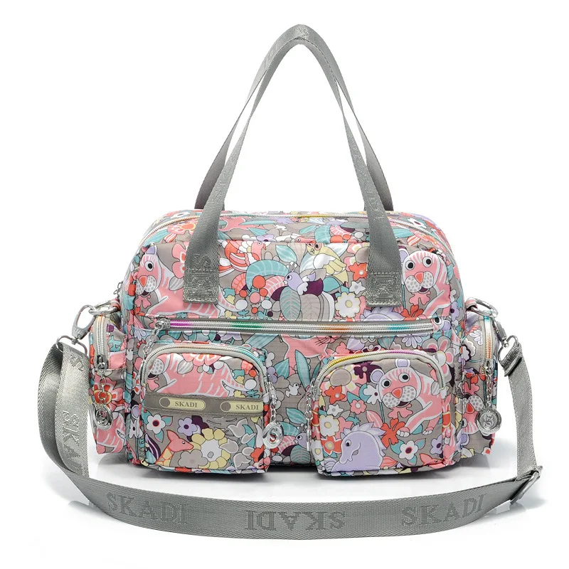 

Ougger Medium Women Handbags Large Capacity Shoulder Casual Style Pink Oxford Flap Bag with Cartoon Printing for Shopping