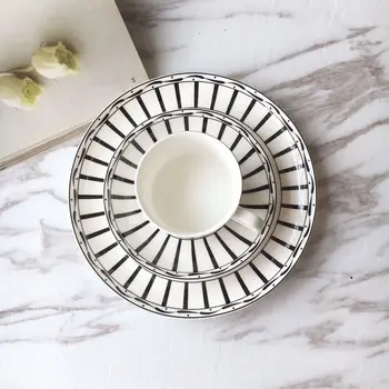 

Creative White Bone China Coffee Simple Cup Saucer Set Traditional Chinese Tea Cups Taza Cafe Portatil Home Drinkware OO5050