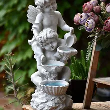 Открытый сад два ангела мальчиков держа чайник Ремесла статуи декор дома двора балкон с лампы от солнечной батареи скульптуры