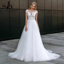 SoDigne Bohemian Wedding Dress Lace Appliques illusion Button Cap Sleeves Beach Bridal Dress Princess Tulle Wedding Gowns 2021