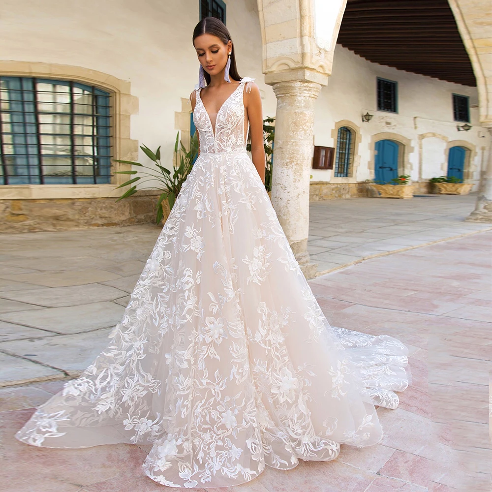 Gorgeous A-line Tulle Appliques Lace Wedding Dress for Bride with V-neck Tassel Sleeveless Bridal Gowns with Sweep Train 1