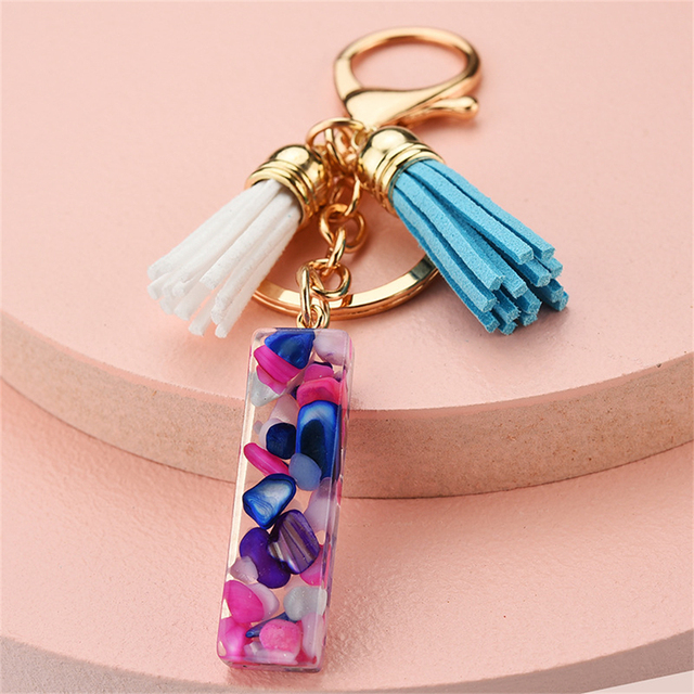 Women Keychains 26 Glitter Hollowed-out Words Handbag Tassel English Letter Keyring with Puffer Ball Charms Free Shipping