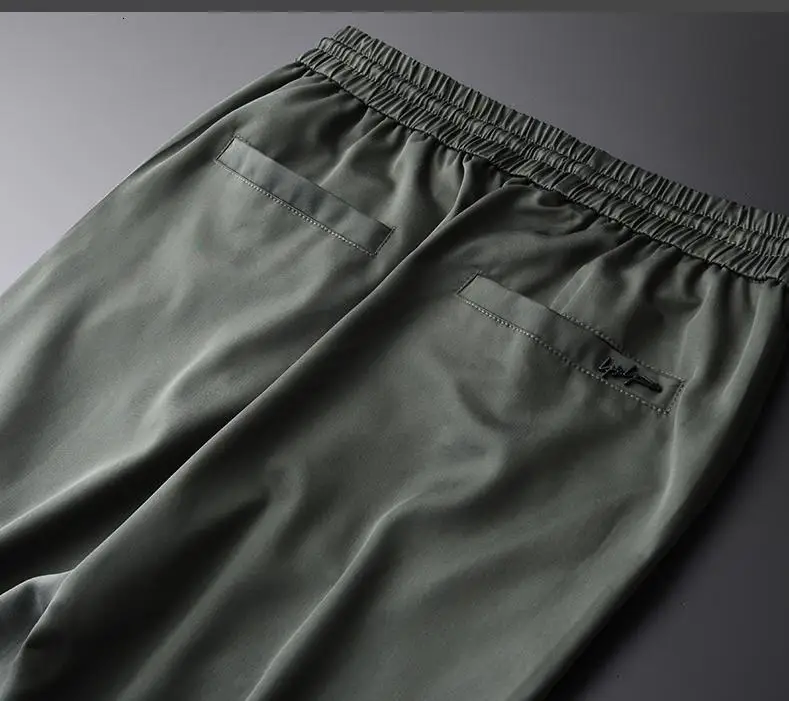 Tencel мужские брюки размера плюс 4xl Роскошные весенние облегающие эластичные мужские брюки высокого качества Модные Зеленые мужские брюки