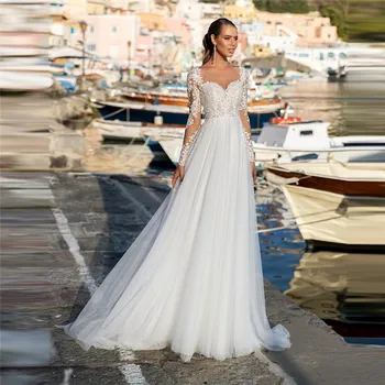 

Long Sleeves Sheer Neck Scoop A-Line Tulle Wedding Dresses Lace Appliques 2021 Modest Buttons Back Bridal Gowns For Wedding