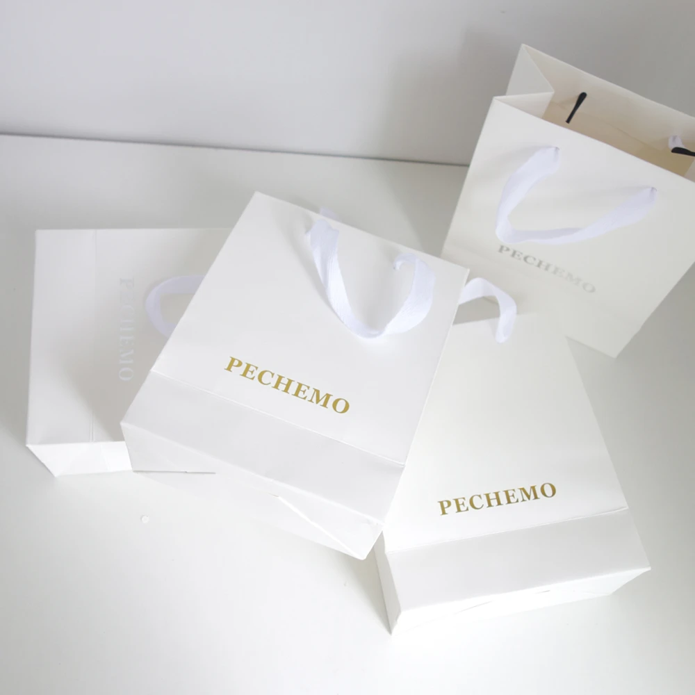 Wholesale Retail Price White Card Paper Bag with Printed Logo for Gift  Present Clothing Hair Shopping Bags with Ribbon Handle - China Custom Made Paper  Bag and Gift Paper Bag price