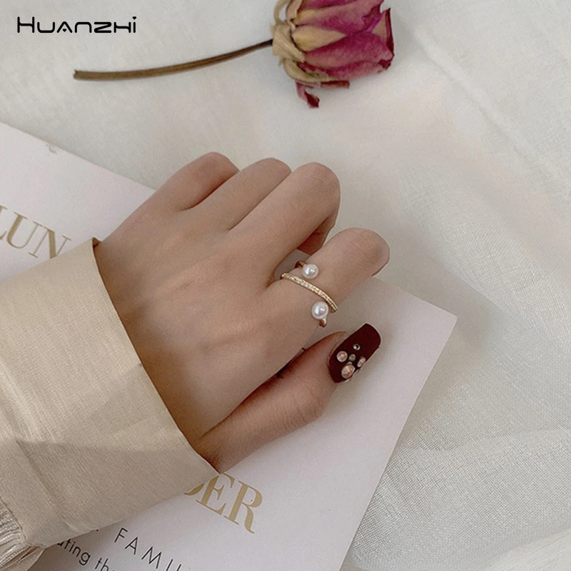 

HUANZHI 2019 Korean New Double Layer Cross Pearl Rhinestone Zircon Micro-inlay Gold Metal Rings for Women Girls Wedding Party