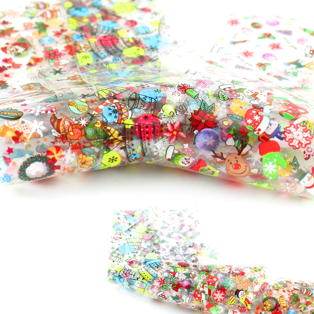 

10pcs Christmas Transfer Foils for Nails Elk Santa Flower Snowman Stickers Decals Sky Paper Nail Art Sliders Decoration