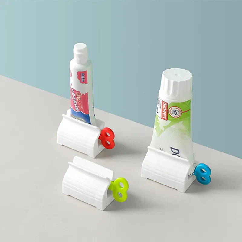 Toothpaste Squeezer Holder Tube Rolling Easy Bathroom Stand Plastic Dispenser 