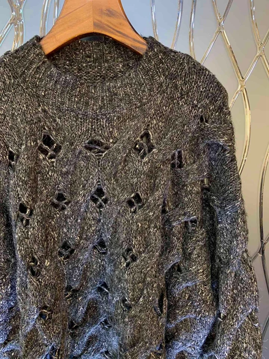 early autumn new female round neck hollowed out hole decorating pure color sweater sweater sweater 922