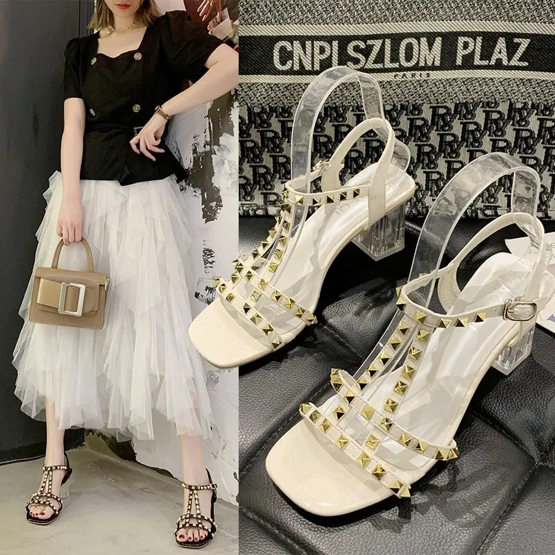 

Fashion personality crystal thick heel sandals female summer 2020 new wild high heels word buckle rivets Roman sandals Z954