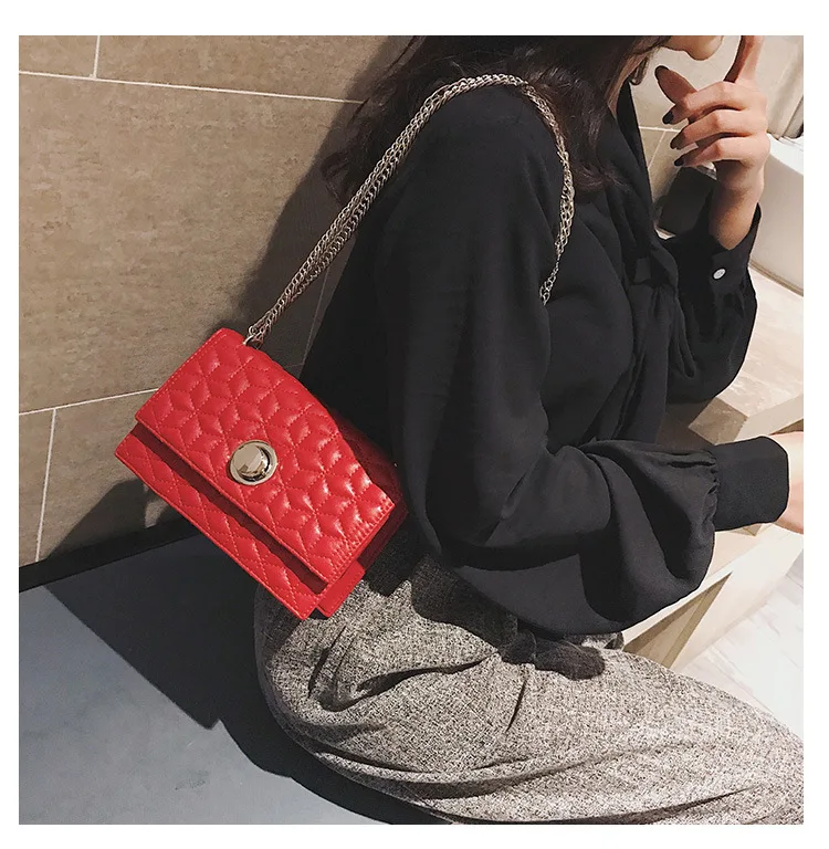 

Korean version of three-dimensional simple small square bag plum blossom embossed lock chain single shoulder oblique span